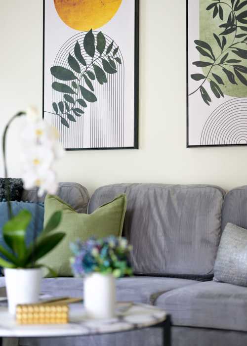 Living room with a comfortable couch at Windsor Court and Tower in Silver Spring, Maryland