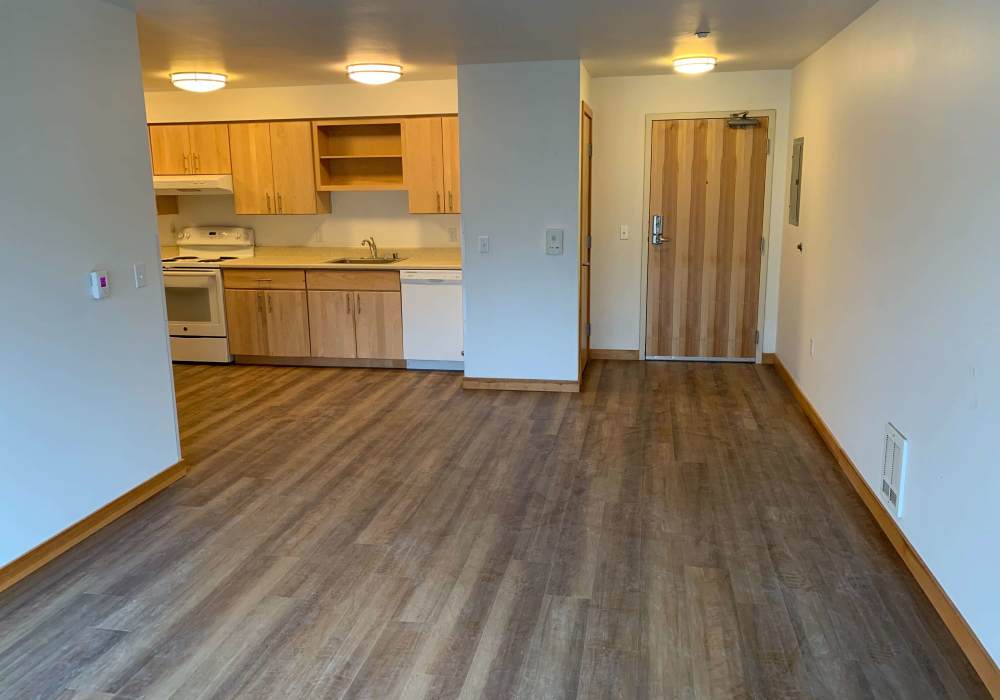 Residence with wood-style flooring at Compass on Dexter in Seattle, Washington