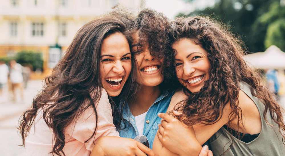 Resident friends enjoying time together near Meadow Branch Apartments in Winchester, Virginia