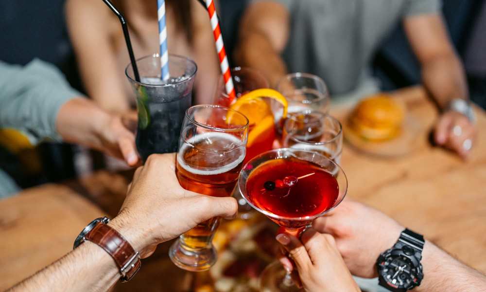 Resident enjoying drinks in a restaurant near Truckee River Terrace in Reno, Nevada