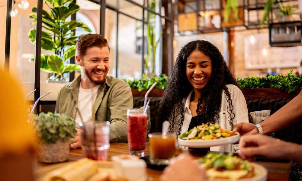 Residents enjoying food in the local restaurant near Savannah Square & Savannah Harbor in Norman, Oklahoma