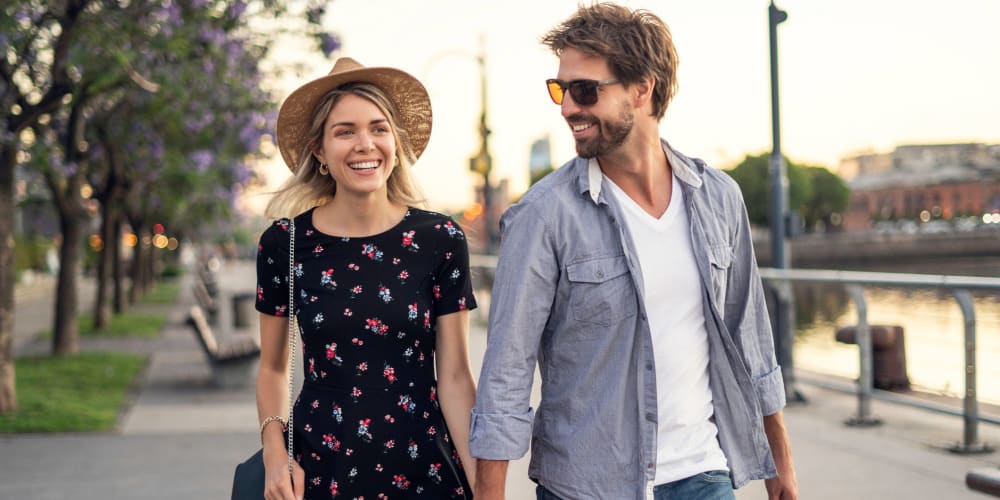 A couple walking downtown near Mosby Poinsett in Greenville, South Carolina