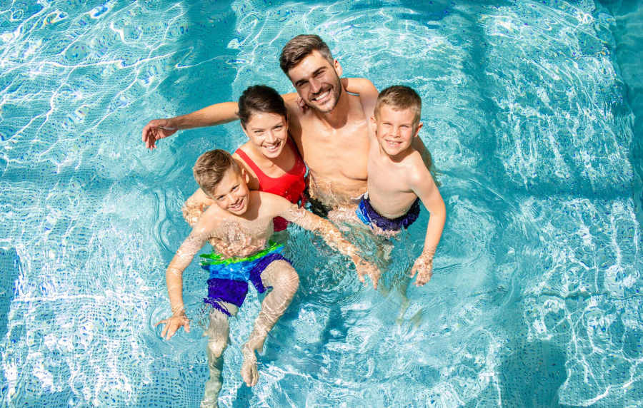 Residents in the swimming at pool at Edgewood Group Apartments in Merrillville, Indiana