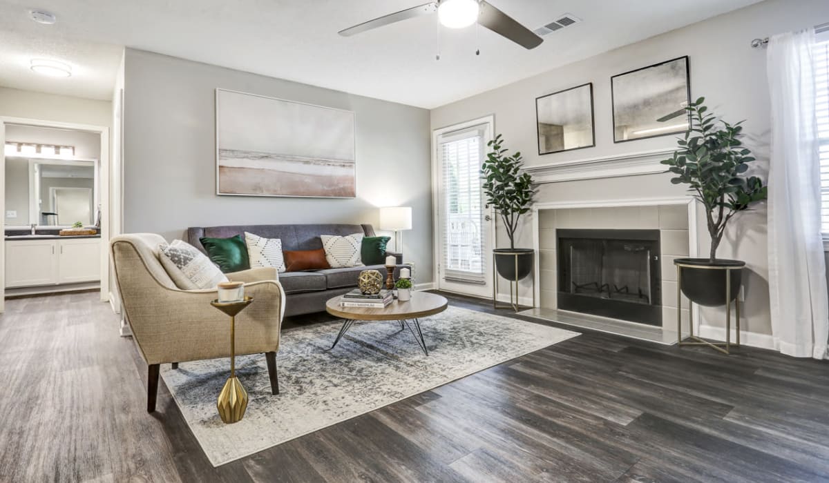 Living room with modern furnishings at The Laurel Apartments in Spartanburg, South Carolina
