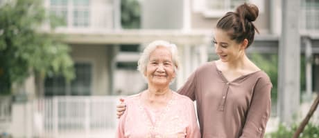 Resident with caregiver at The Commons at Dallas Ranch in Antioch, California