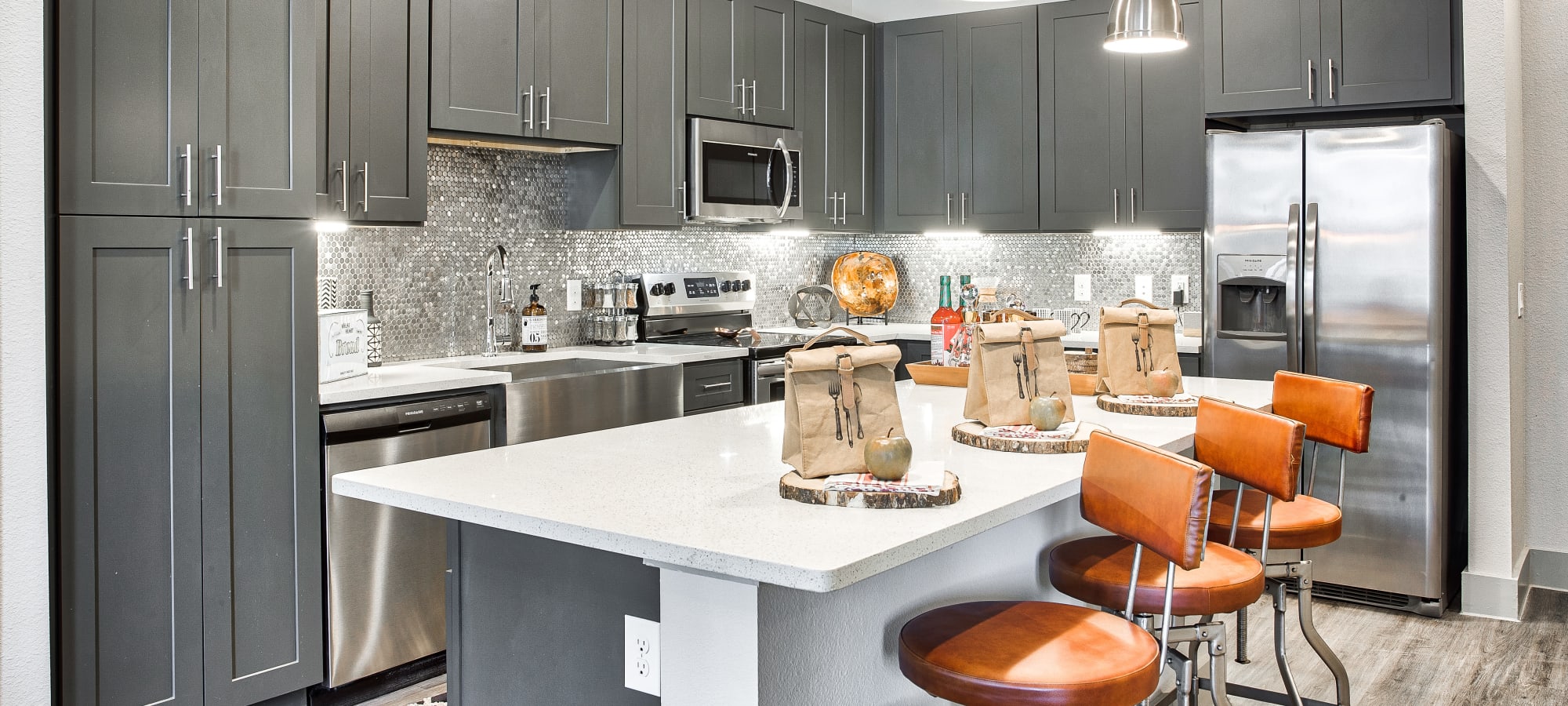 Kitchen in model unit at The Carter apartments in Grapevine, Texas
