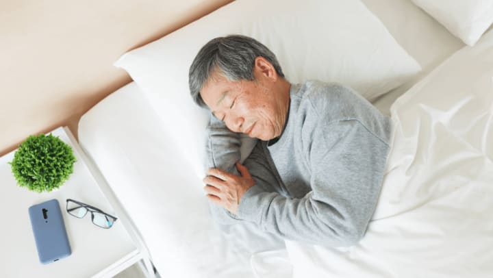 a senior sleeping