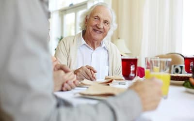 Resident enjoying his meal at Mattison Crossing at Manalapan Avenue in Freehold, New Jersey