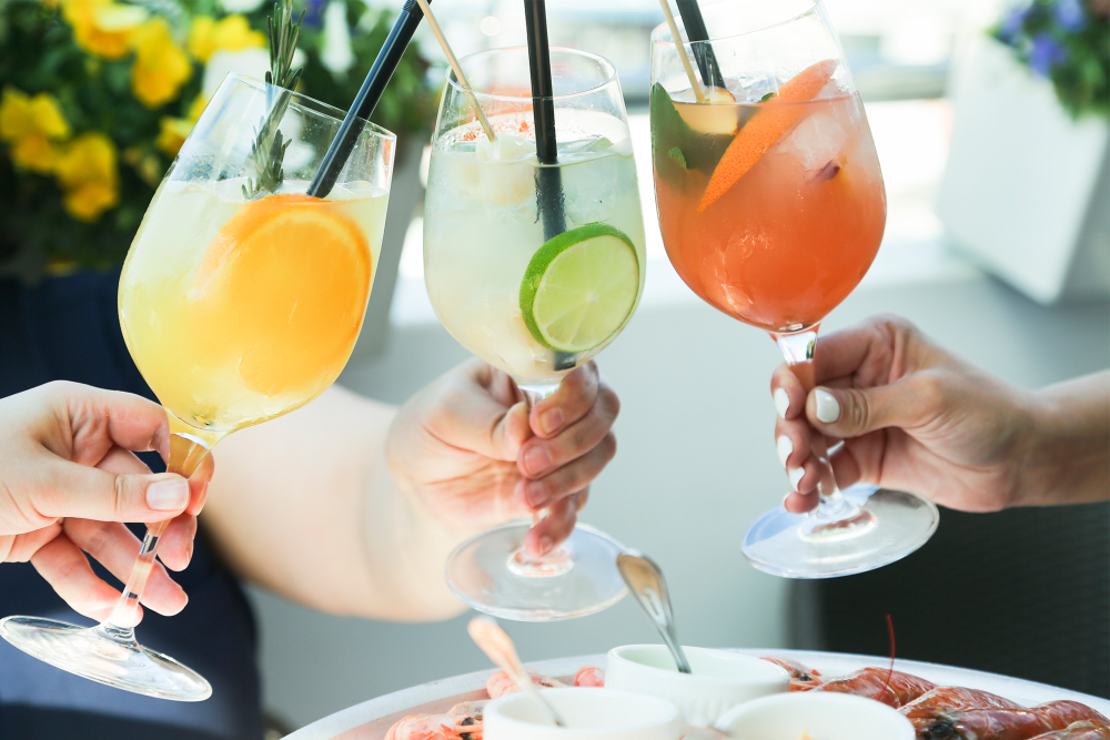 Residents having drinks at Cassia Apartments in Santa Maria, California