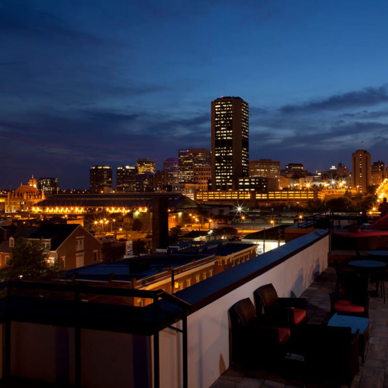 Nighttime city skyline view from rooftop patio at Cedar Broad, Richmond, Virginia