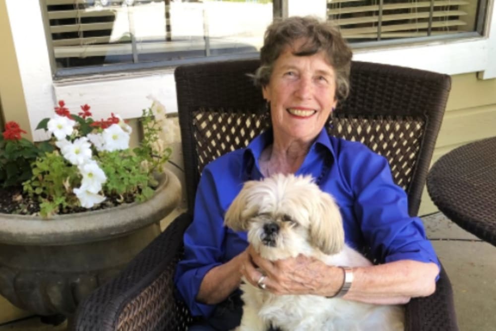 Happy friends eating lunch out and about  at Hilltop Commons Senior Living in Grass Valley, California