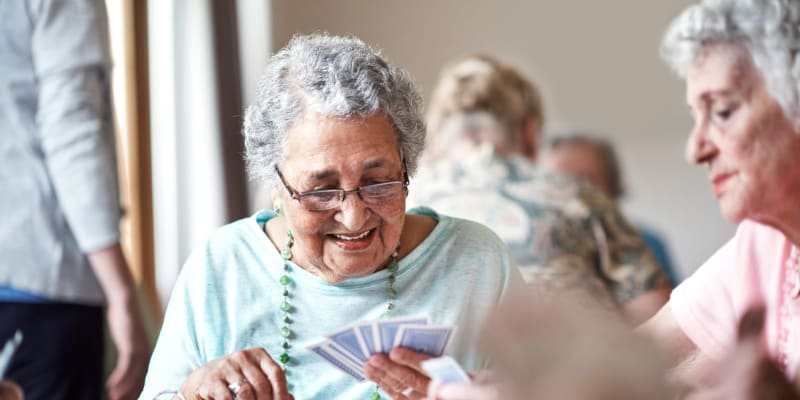Residents playing cards at The Blake at Charlottesville in Charlottesville, Virginia