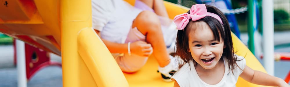 Children on a slide at a park near Trinity Way in Fremont, California