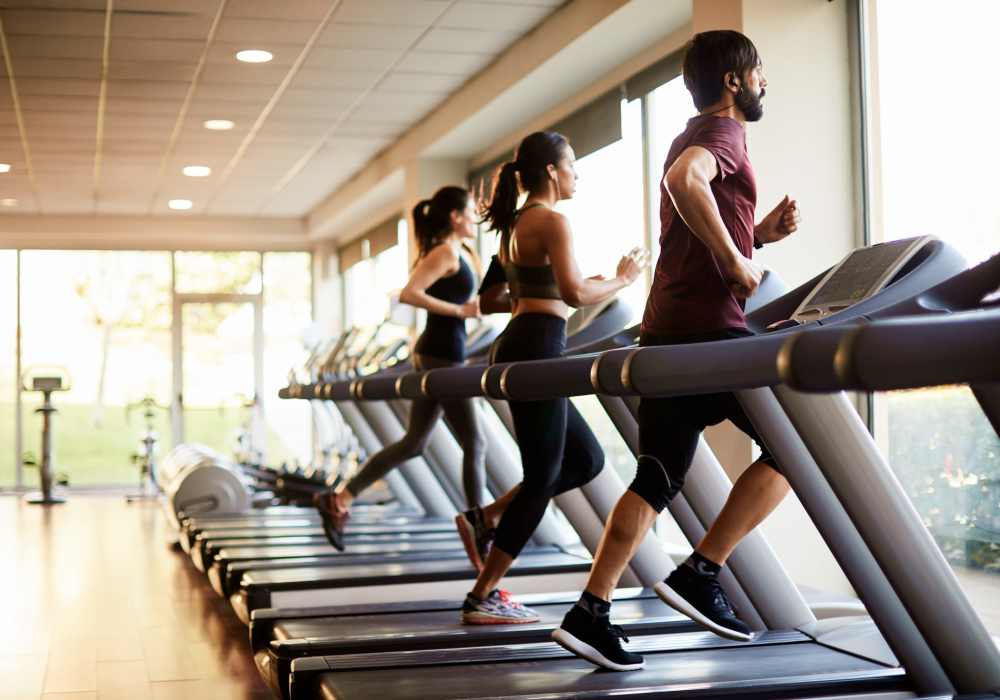 Residents using treadmills in a fitness center at Copper Hill in Spokane, Washington