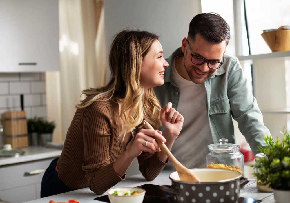A couple preparing meal at Silo Creek Apartments in Lafayette, Louisiana