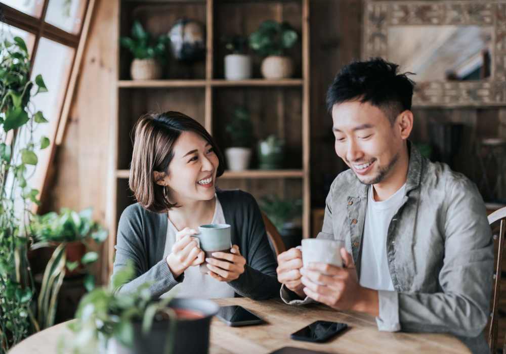 Resident having coffee at a cafe near Red Knot at Edinburgh in Chesapeake, Virginia