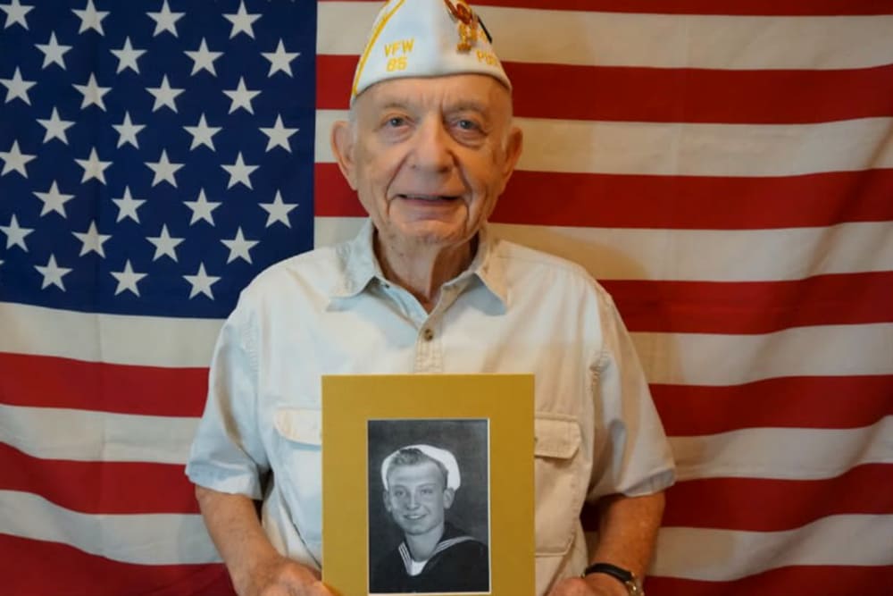 Proud veteran celebrating Veteran's Day at Campus Commons Senior Living in Sacramento, California