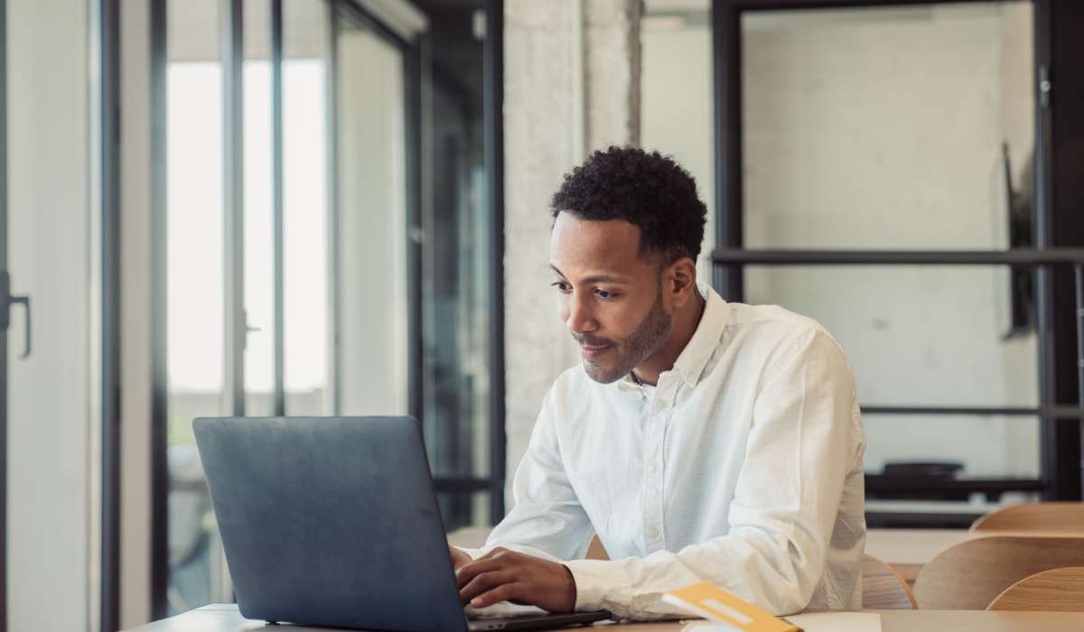 Employee working on their laptop at The Quincy in Philadelphia, Pennsylvania