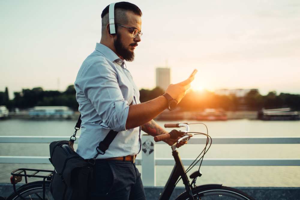 Man on bike listening to music SoBA Apartments in Jacksonville, Florida