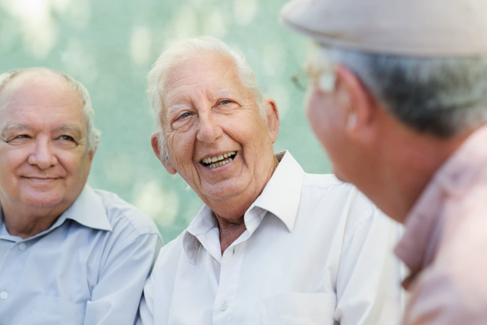 Residents chatting and hanging out on a ncie day at Park Place Apartments in Sacramento, California