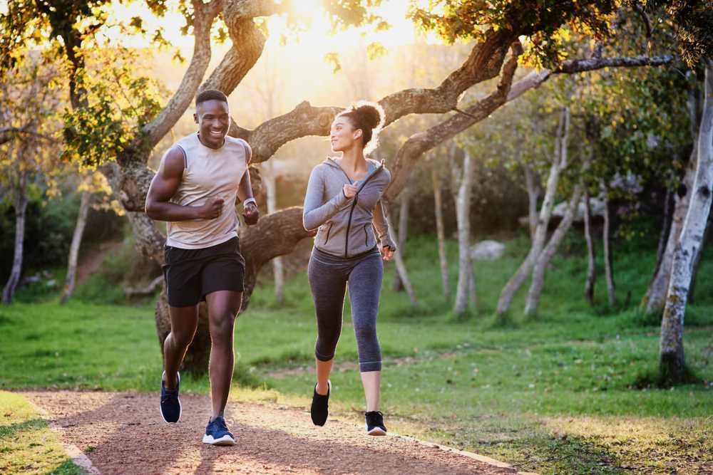 Couple jogging in the park at Nova Central Apartments in Davie, Florida
