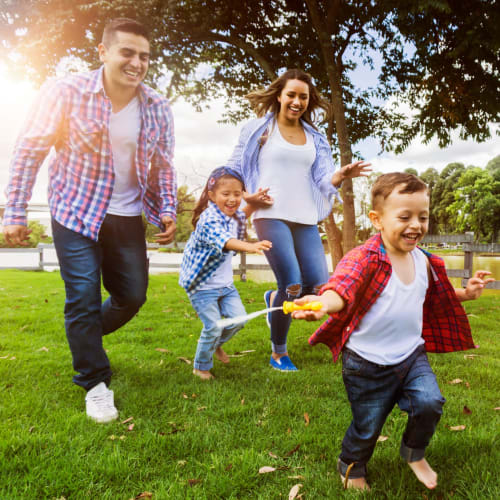 A family playing at a park near Lovell Cove in Patuxent River, Maryland