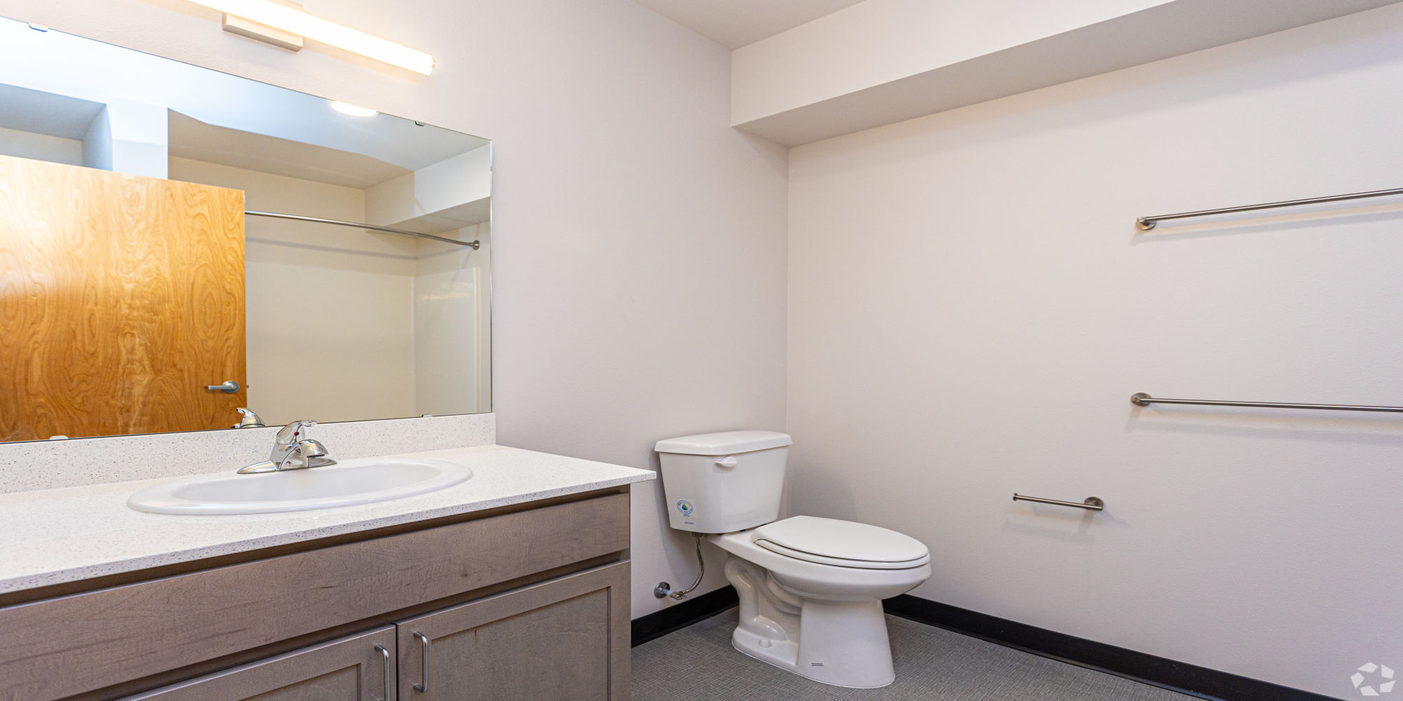 Toilet and bath at Housing Hilltop in Tacoma, Washington
