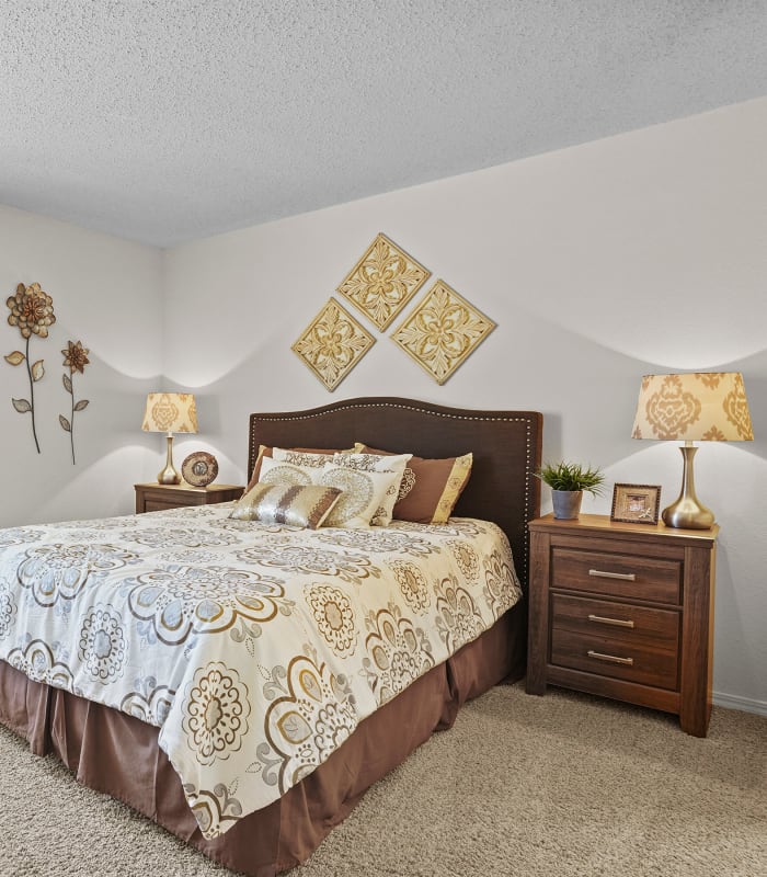 The Spacious carpeted bedroom at Creekwood Apartments in Tulsa, Oklahoma
