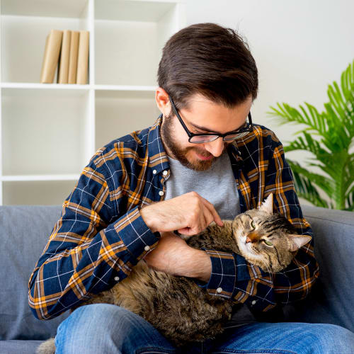 A resident holding his cat at Santa Margarita in Oceanside, California