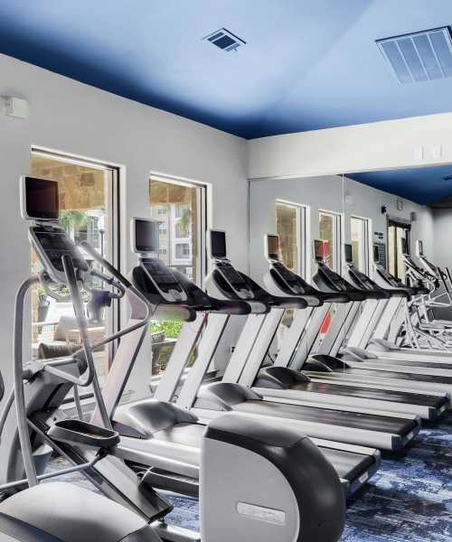 Well-equipped fitness center at Seagrove in Conroe, Texas