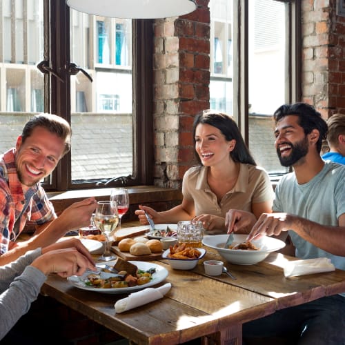 A residents having their dinner at restaurant near Holly Square in Imperial Beach, California