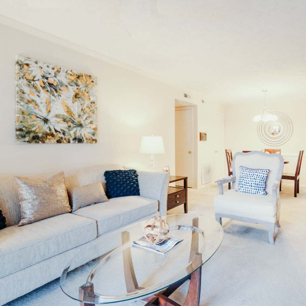 Living room with couch, coffee table and chairs at Tapestry on Vaughn in Montgomery, Alabama, 