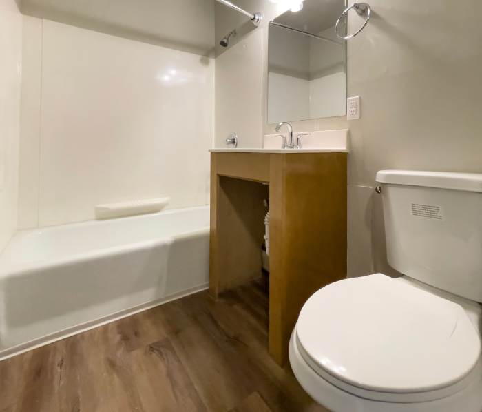 Bathroom with bath tub at District on Oakwood in Muncie, Indiana
