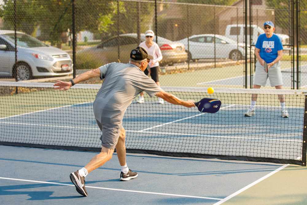 Residents playing pickleball at Touchmark at Meadow Lake Village in Meridian, Idaho