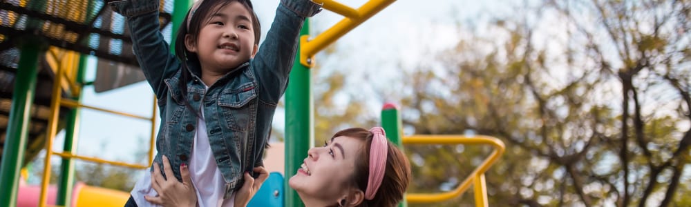 Children on a slide at a park near Westland Gardens in Toledo, Ohio