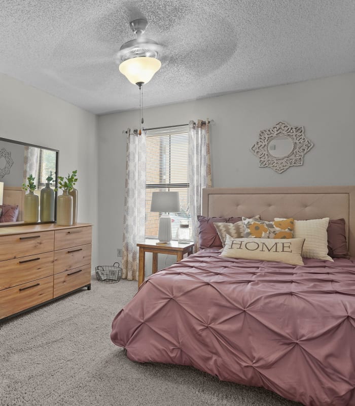 the Spacious bedroom with large windows at Cimarron Pointe Apartments in Oklahoma City, Oklahoma