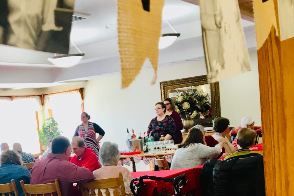Residents enjoy wine tasting at Prairie Hills Independence in Independence, Iowa.