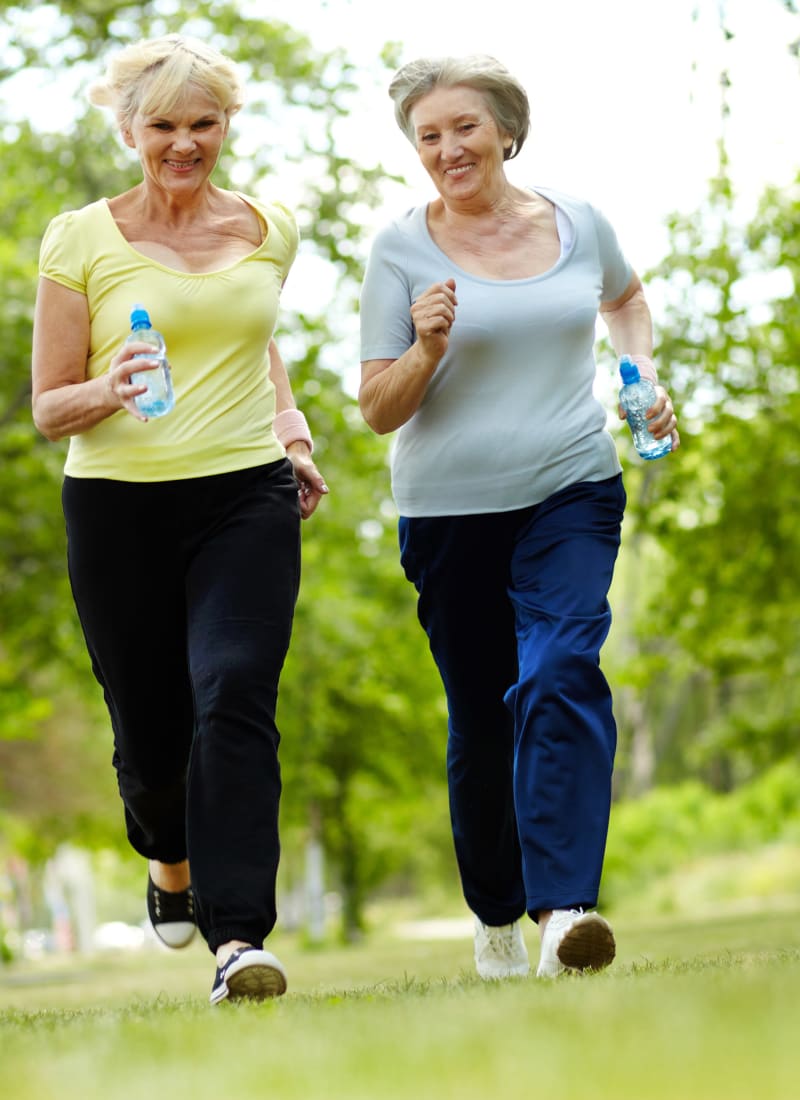 Residents enjoying a walk together near Marquis Rockwall in Rockwall, Texas