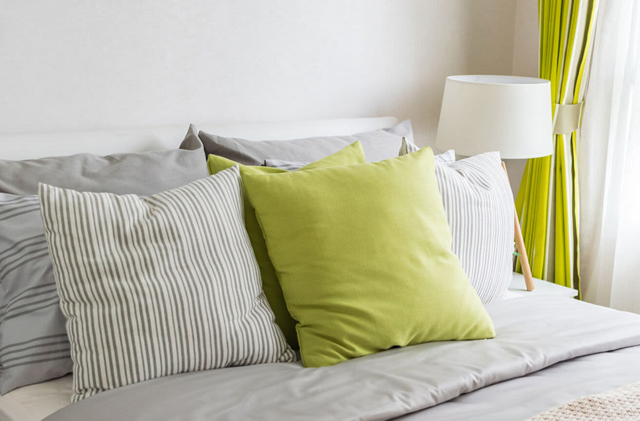 Cozy bedroom with pillows at 270 Huntington in Boston Massachusetts