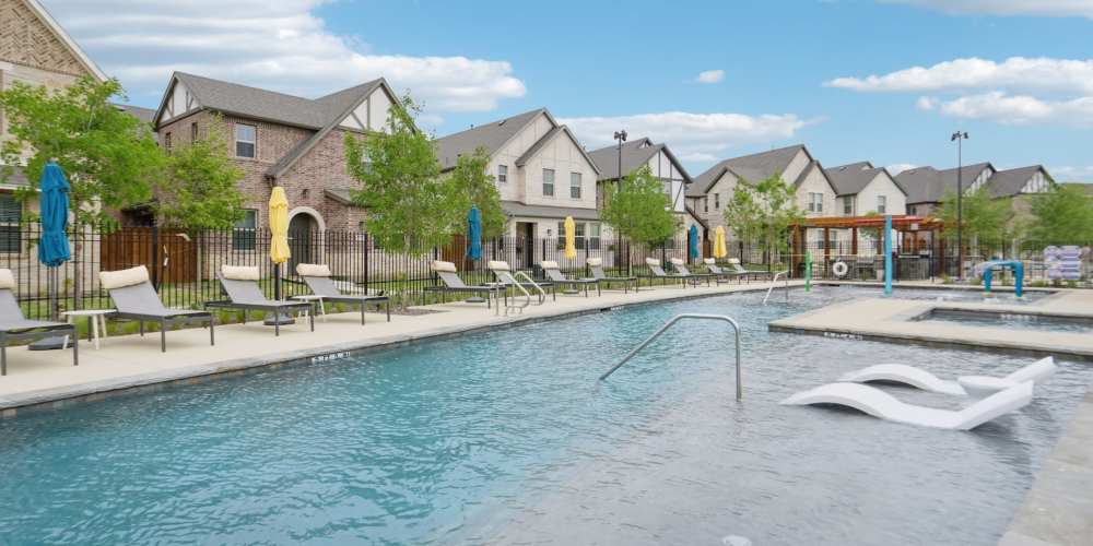 A happy family enjoying their new home at BB Living The Tribute in The Colony, Texas