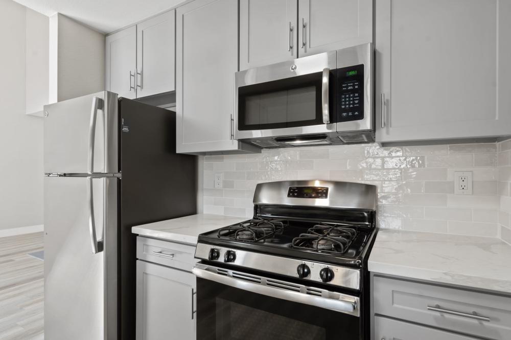 Apartment luxury kitchen with stainless-steel appliances at Deer Valley Apartment Homes in Roseville, California