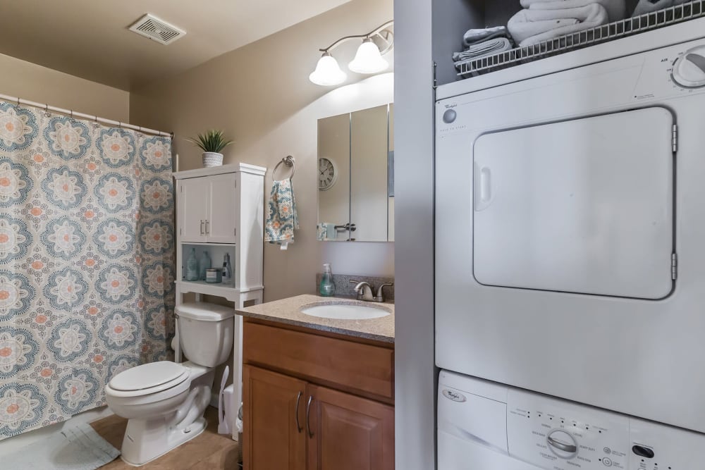 Combination bathroom and laundry room at The Village at Voorhees in Voorhees, New Jersey