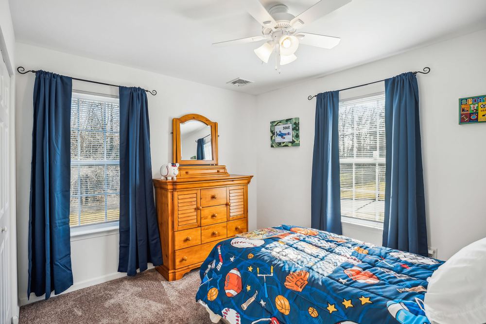 white living room at United Communities in Joint Base MDL, New Jersey