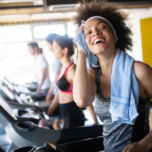 A resident exercising in gym at Miramar Milcon in San Diego, California