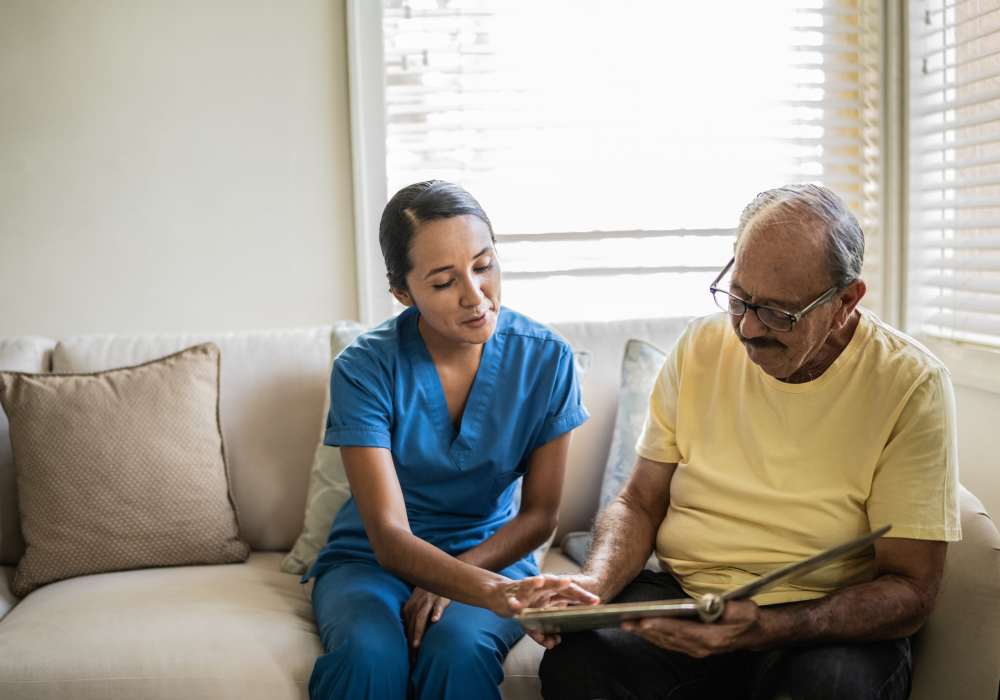 Resident with his caretaker at Clearwater at The Heights in Houston, Texas