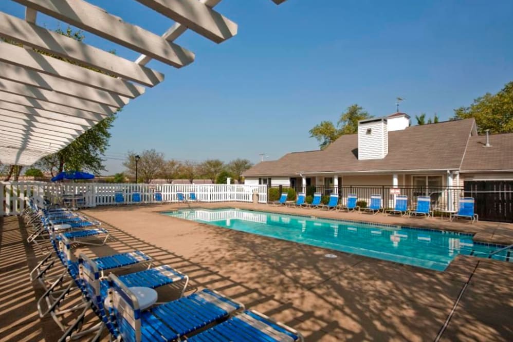 A swimming pool with a large sundeck at Green Wood in Gallatin, Tennessee