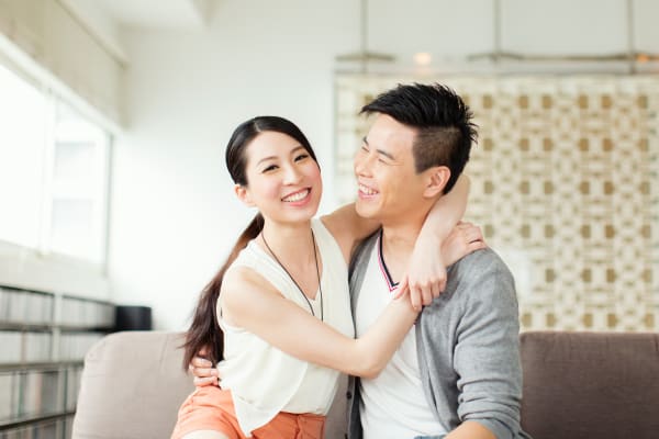 couple embracing in their new home at The Pines at Castle Rock Apartments in Castle Rock, Colorado