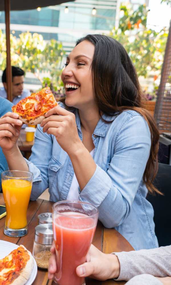 Resident having lunch at restaurant near The Abbey at Stone Oak in San Antonio, Texas