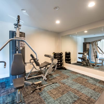 Exercise machines and free weights in the fitness center at Sofi Thousand Oaks in Thousand Oaks, California