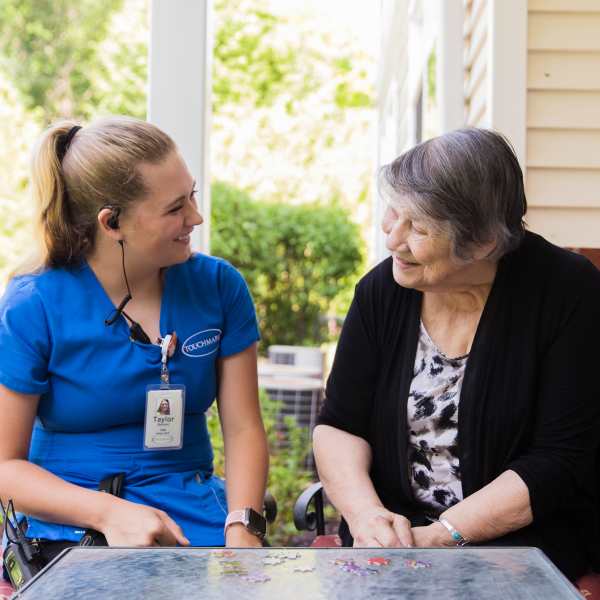 Team member with resident.